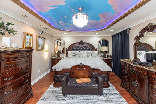 11157 Jackson Ter, Corpus Christi, TX 78410 - bedroom featuring a tray ceiling, dark wood-style flooring, and ornamental molding