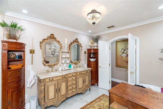 11157 Jackson Ter, Corpus Christi, TX 78410 - bathroom featuring double vanity, ornamental molding, and recessed lighting