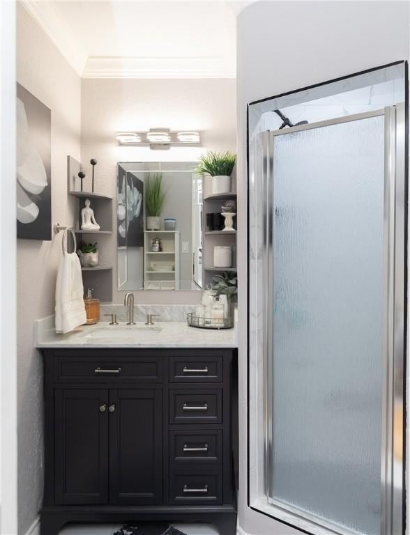 11157 Jackson Ter, Corpus Christi, TX 78410 - bathroom with a shower stall, vanity, and ornamental molding