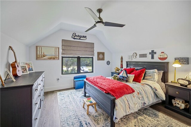 340 Warbler Dr, Spring Branch, TX 78070 - bedroom with vaulted ceiling, wood finished floors, ceiling fan, and baseboards