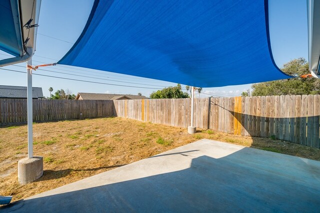 view of patio with a fenced backyard