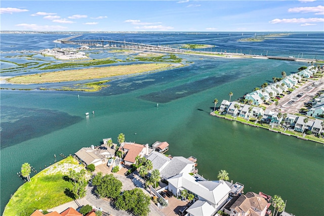 bird's eye view with a water view