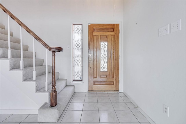 13714 A La Entrada St, Corpus Christi, TX 78418 - entryway with stairway, baseboards, and light tile patterned floors