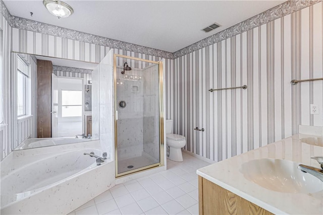 13714 A La Entrada St, Corpus Christi, TX 78418 - bathroom featuring wallpapered walls, tile patterned floors, a stall shower, toilet, and a bath
