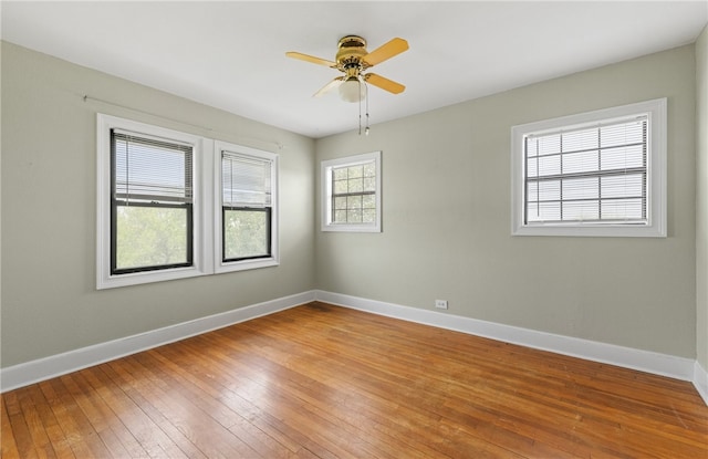 19838 County Road 1168, Mathis, TX 78368 - spare room featuring baseboards, light wood-style flooring, and a ceiling fan