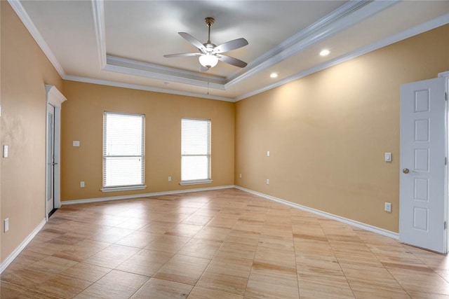 unfurnished room featuring recessed lighting, a raised ceiling, ornamental molding, a ceiling fan, and baseboards