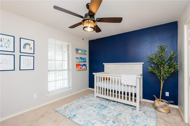 7617 Dijon Lake Dr, Corpus Christi, TX 78413 - bedroom featuring carpet flooring, a crib, and baseboards