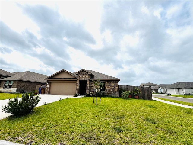 1353 Regents Park Ln, Corpus Christi, TX 78415 - single story home with driveway, a garage, and stone siding