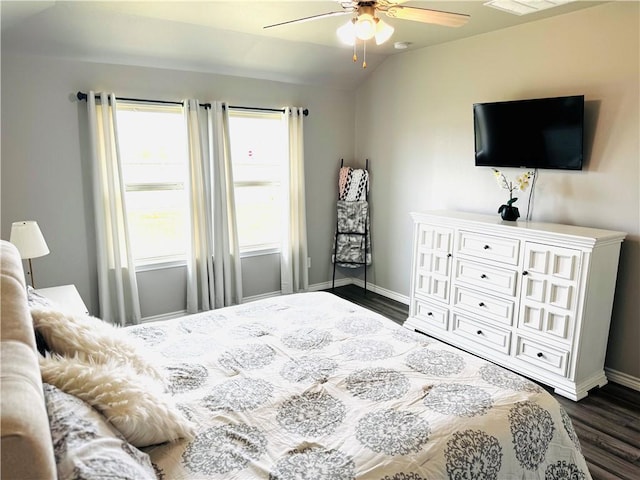 1353 Regents Park Ln, Corpus Christi, TX 78415 - bedroom featuring dark wood finished floors, baseboards, vaulted ceiling, and ceiling fan