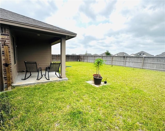 1353 Regents Park Ln, Corpus Christi, TX 78415 - view of yard featuring a patio