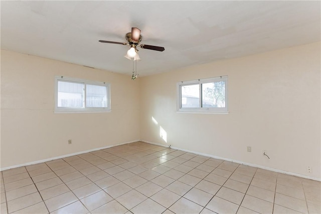 spare room with ceiling fan