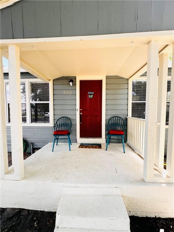 property entrance with a porch