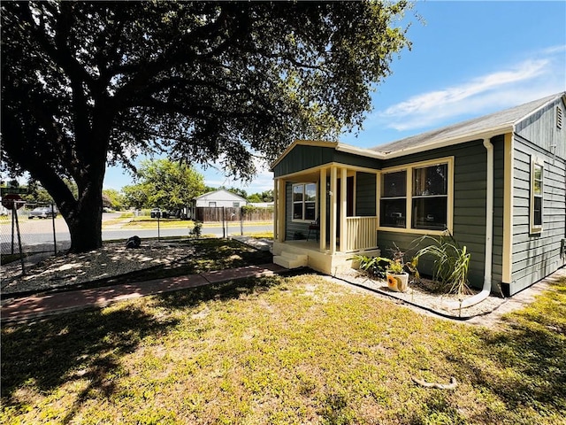 exterior space featuring a lawn