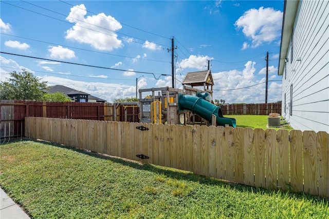 view of yard featuring a playground and cooling unit