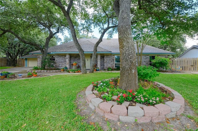 ranch-style house with a front lawn