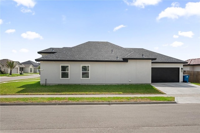 102 Prestwick Dr, Portland, TX 78374 - view of side of property featuring fence, a yard, an attached garage, driveway, and roof with shingles