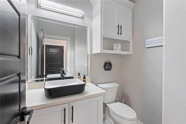 102 Prestwick Dr, Portland, TX 78374 - half bathroom featuring toilet and vanity