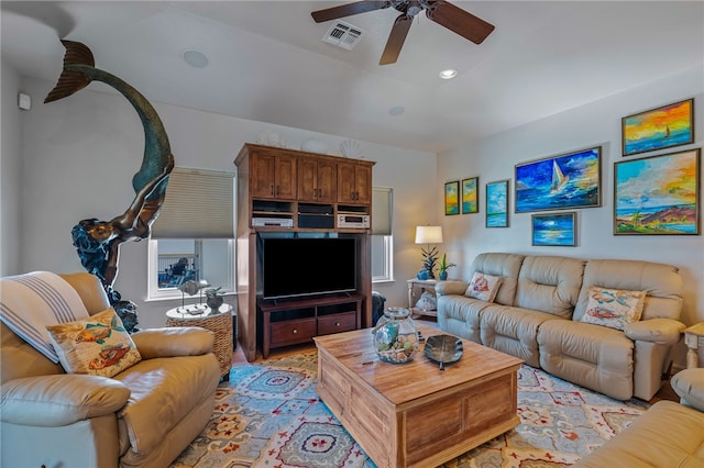 living room featuring ceiling fan