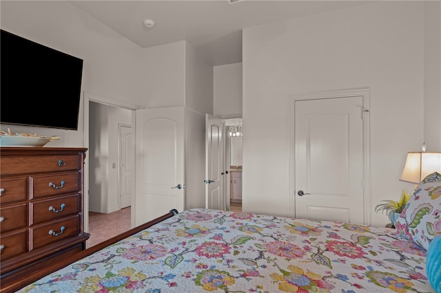 bedroom featuring dark hardwood / wood-style flooring