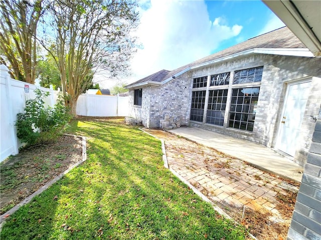 view of yard with a patio