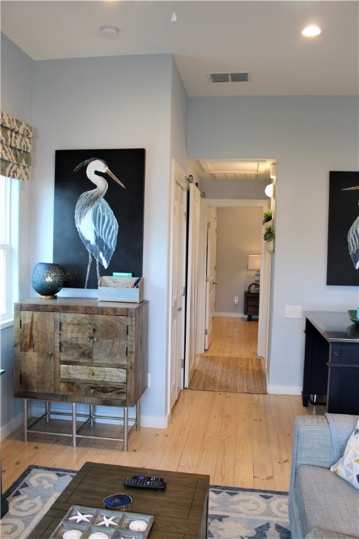 corridor featuring light hardwood / wood-style flooring