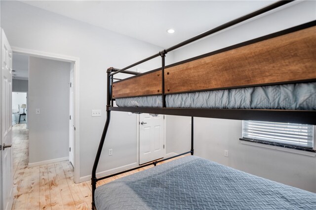 bedroom with light wood-type flooring