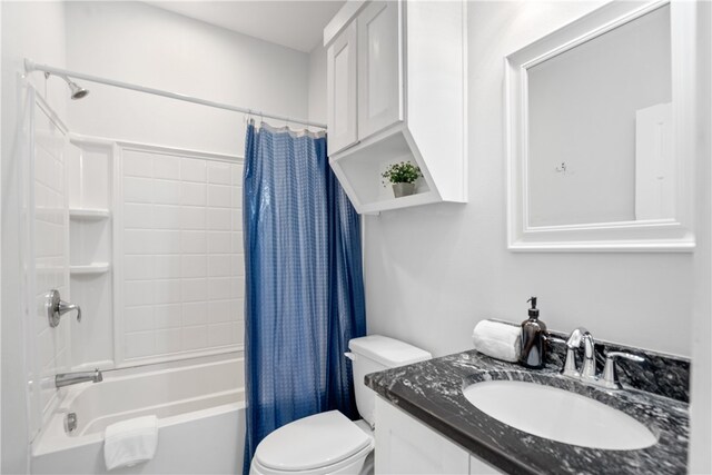 full bathroom featuring vanity, toilet, and shower / bathtub combination with curtain