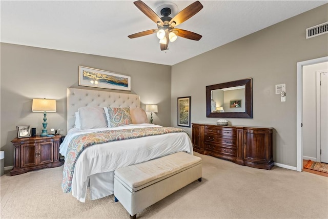 bedroom featuring carpet flooring, baseboards, visible vents, and ceiling fan