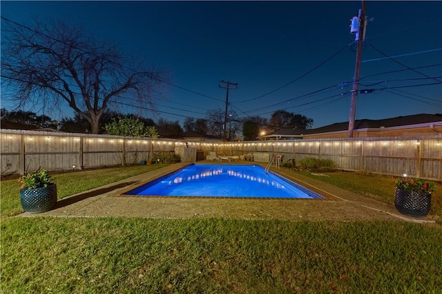 view of pool featuring a yard, a fenced in pool, and a fenced backyard