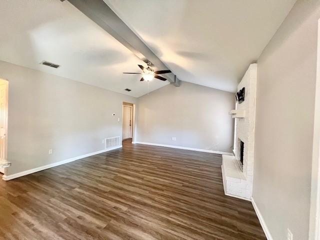 unfurnished living room featuring a fireplace, dark hardwood / wood-style flooring, vaulted ceiling with beams, and ceiling fan