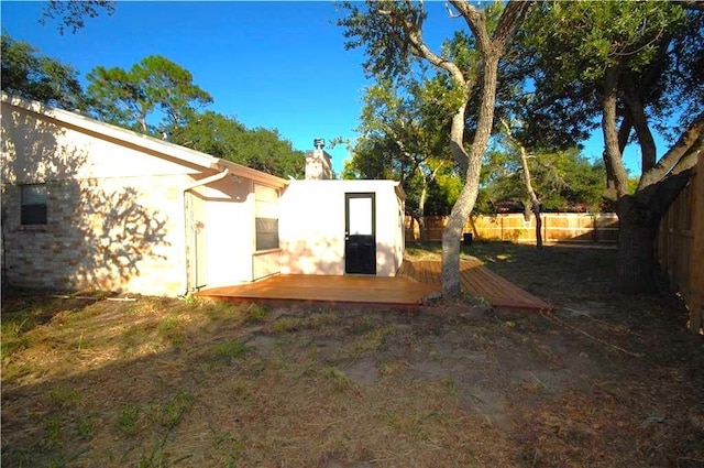 view of yard with a deck