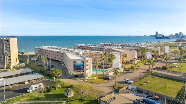 birds eye view of property with a water view