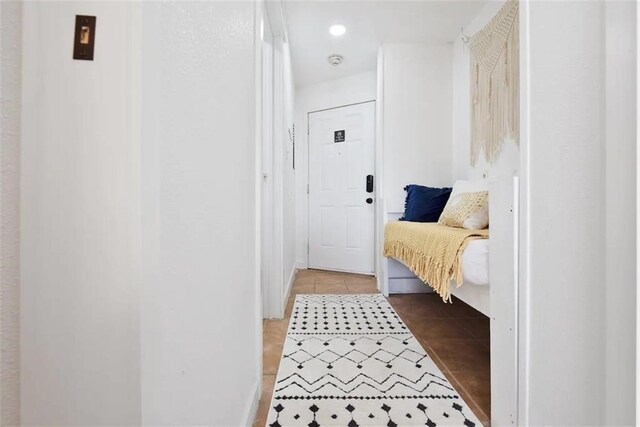 interior space with light tile patterned floors