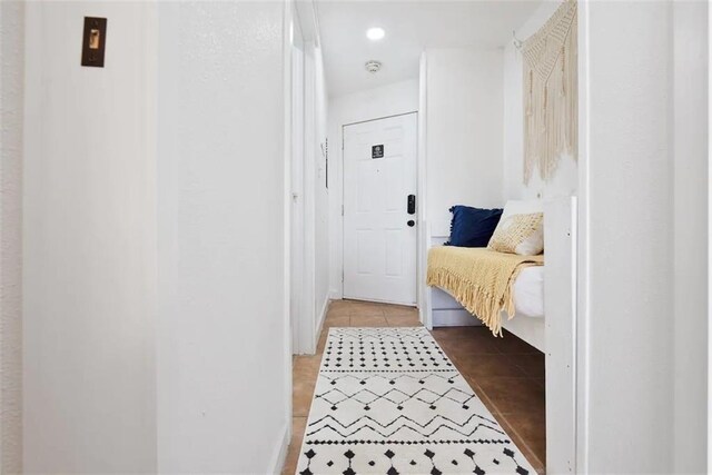 3938 Surfside Blvd Unit 1212, Corpus Christi, TX 78402 - hallway with tile patterned flooring and recessed lighting