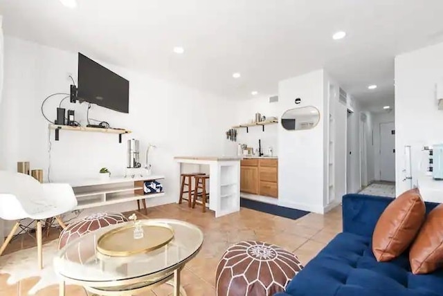 3938 Surfside Blvd Unit 1212, Corpus Christi, TX 78402 - living room with recessed lighting and light tile patterned floors