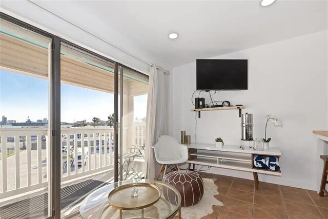 3938 Surfside Blvd Unit 1212, Corpus Christi, TX 78402 - living area featuring tile patterned flooring, healthy amount of natural light, and recessed lighting