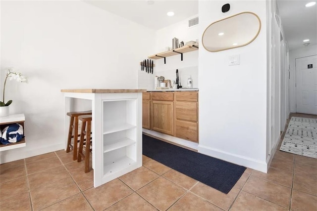 3938 Surfside Blvd Unit 1212, Corpus Christi, TX 78402 - bar area with light tile patterned flooring, recessed lighting, and a sink