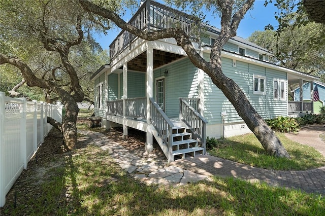 10 Old Cottage Beach Dr, Rockport, TX 78382 - view of side of home featuring covered porch