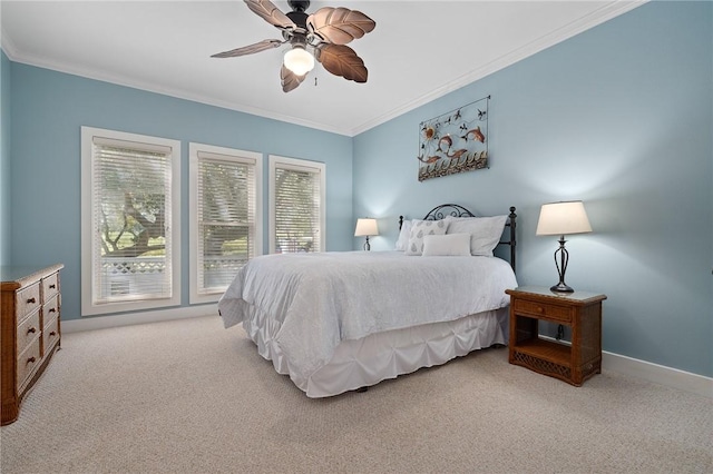 10 Old Cottage Beach Dr, Rockport, TX 78382 - bedroom with ornamental molding, light carpet, a ceiling fan, and baseboards