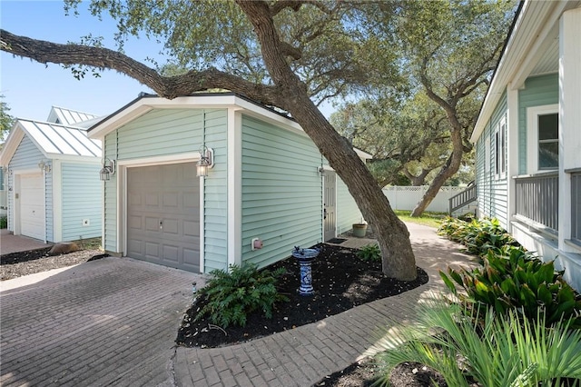 10 Old Cottage Beach Dr, Rockport, TX 78382 - garage featuring decorative driveway