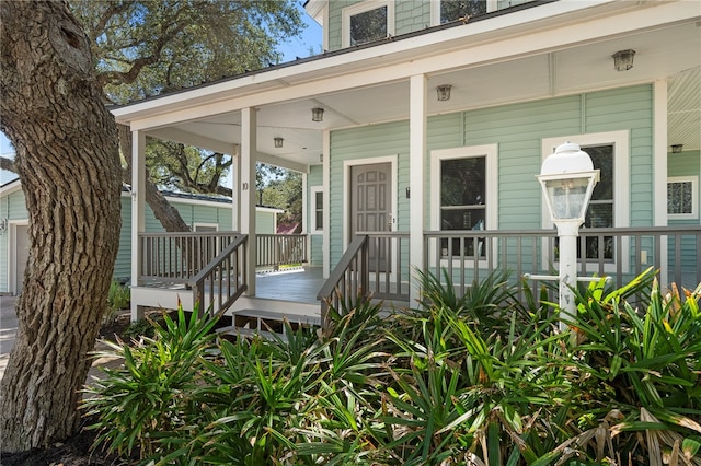 doorway to property with a porch