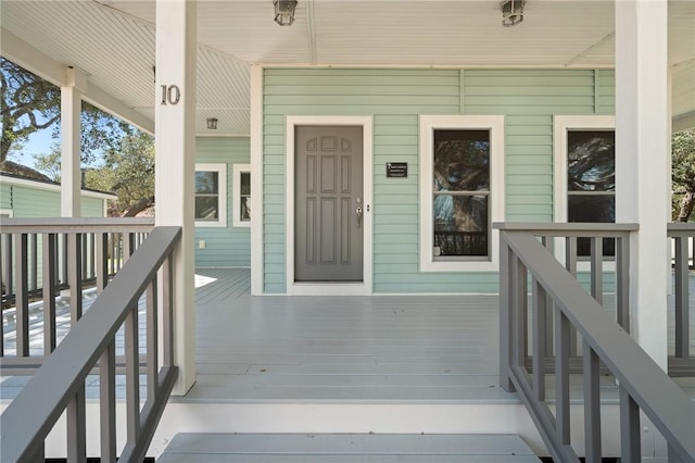10 Old Cottage Beach Dr, Rockport, TX 78382 - doorway to property featuring a porch