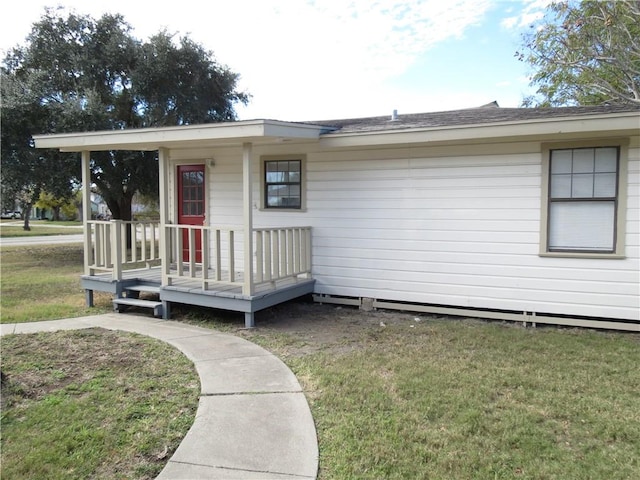 exterior space featuring a yard