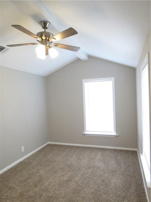 unfurnished room with ceiling fan, lofted ceiling, and carpet floors