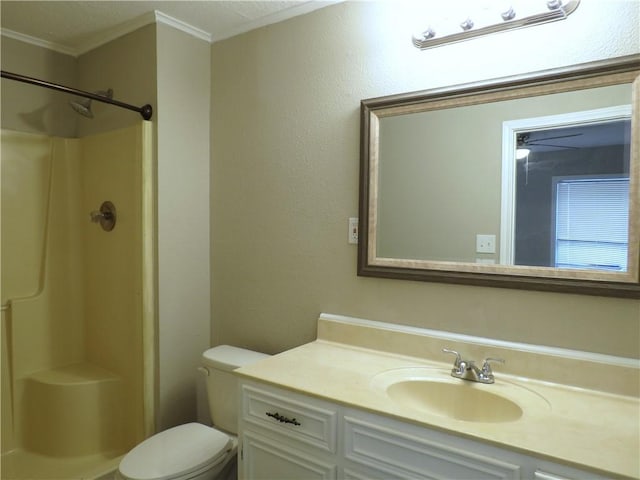 bathroom featuring walk in shower, vanity, toilet, crown molding, and a textured ceiling