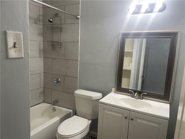 full bathroom featuring vanity, toilet, and tiled shower / bath combo