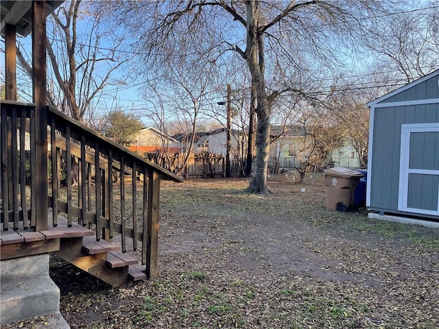 view of yard featuring a storage shed