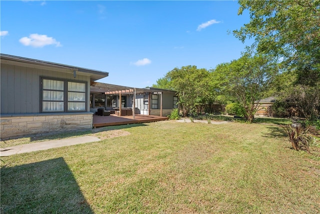 view of yard with a pergola and a wooden deck