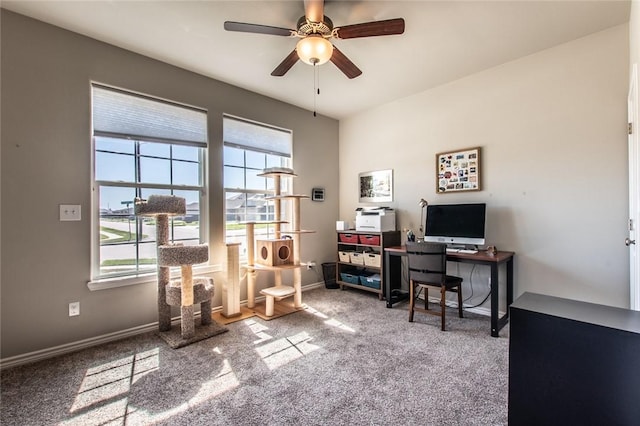 home office with baseboards, ceiling fan, and carpet floors