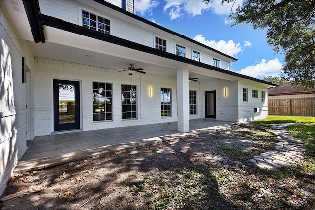 back of house featuring a patio area and ceiling fan